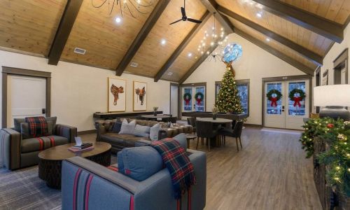 Three Creeks Reserve clubhouse decorated with a Christmas tree and wreaths