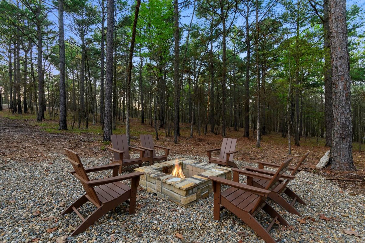 Fire pit among the pines at Lofty Pines