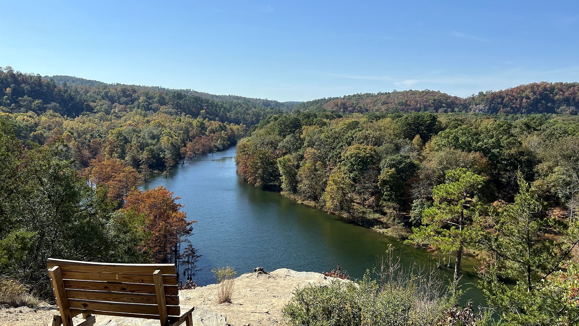 Overlook above the Mountain Fork River with fall color on the hills near Broken Bow